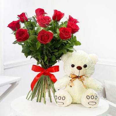 Cute Teddy and Red Roses 