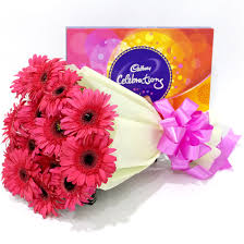 10 pink gerberas and Cadbury